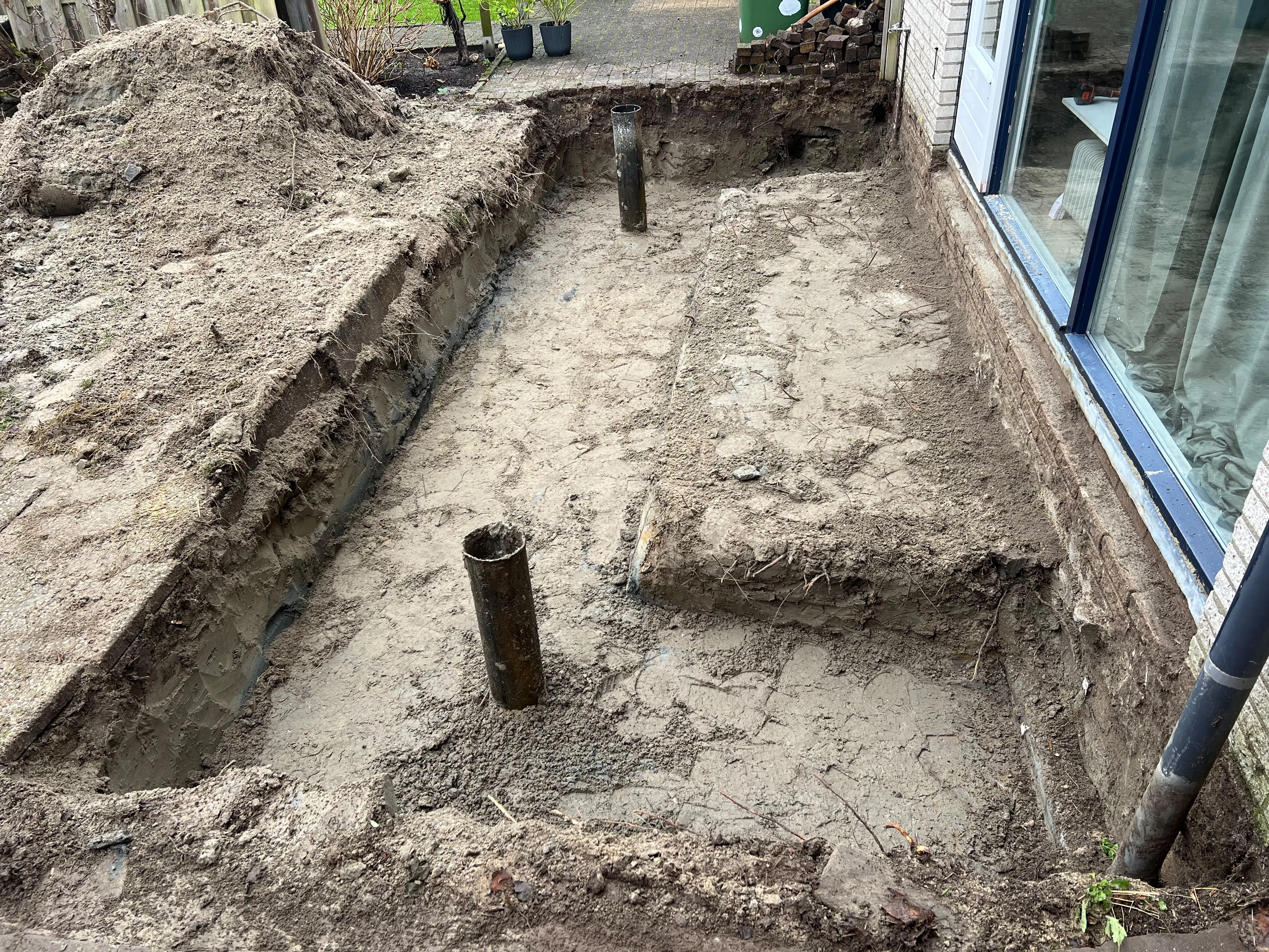 Tuin uitgraven en grond egaliseren
